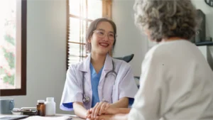 Doctor talking to patient talking about billing