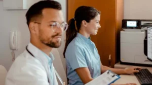 Healthcare RCM company staff on computers