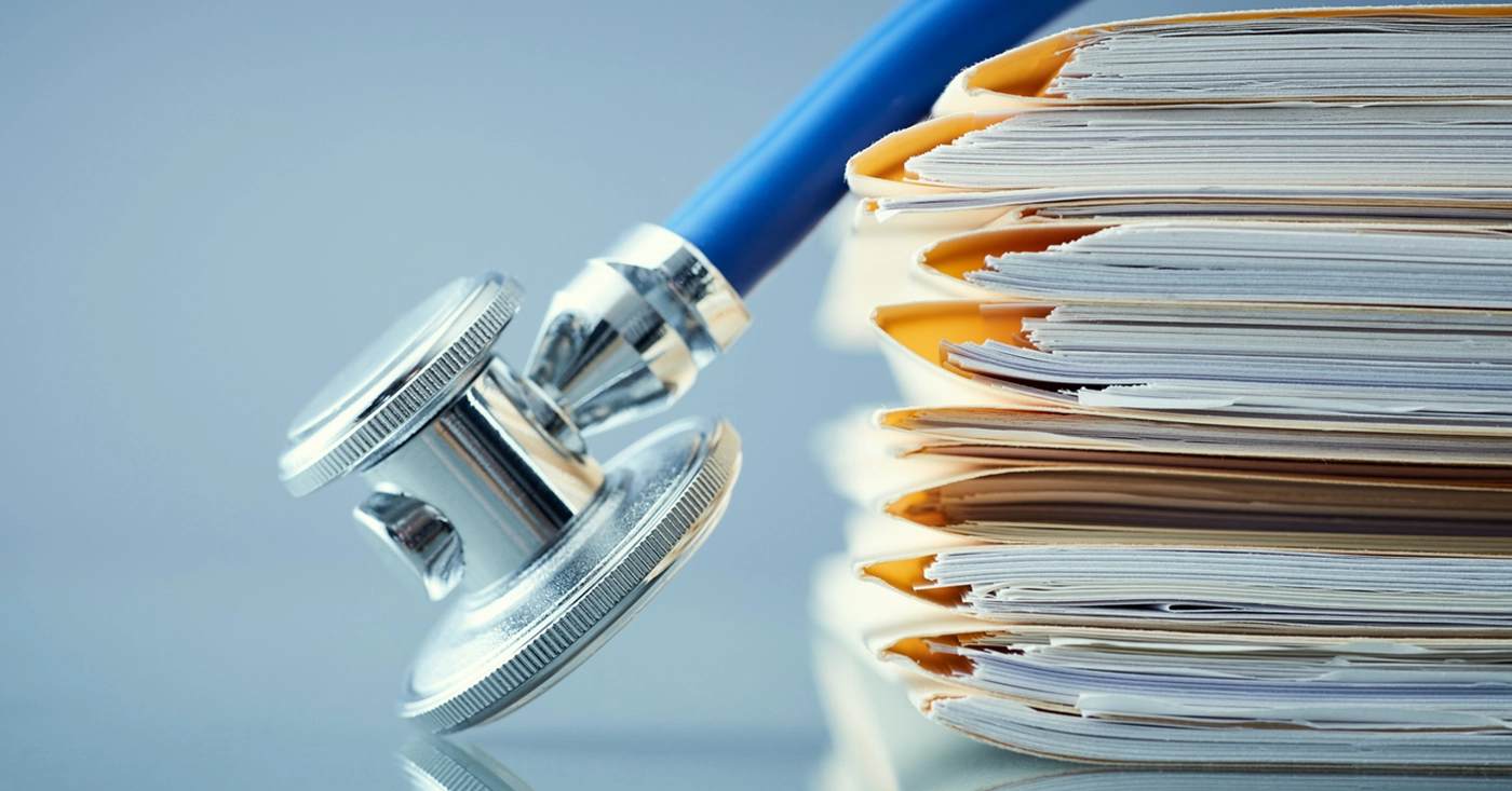 pile-of-medical-records-with-stethoscope