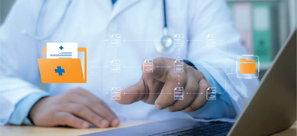 HIPAA compliance for medical practices - A doctor accessing patients’ health records using medical software.