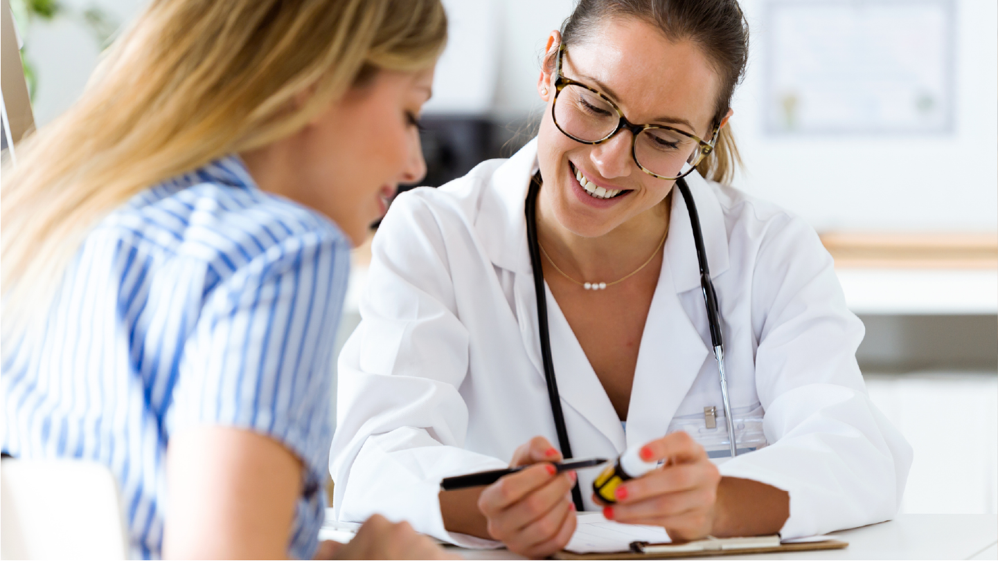 Doctor talking to patients while reducing accounts receivable