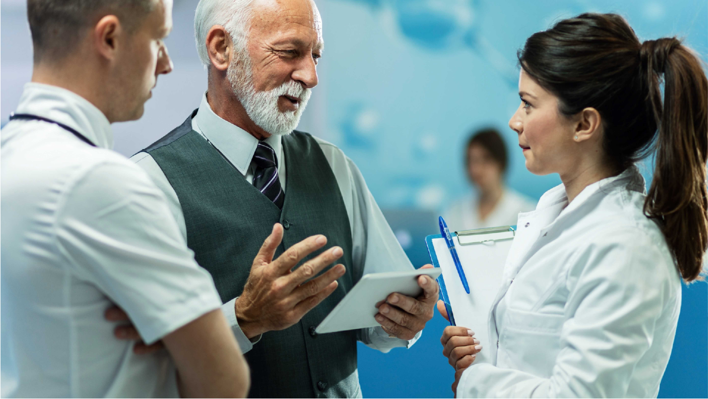 Doctors talking about how automation in healthcare is improving the practice