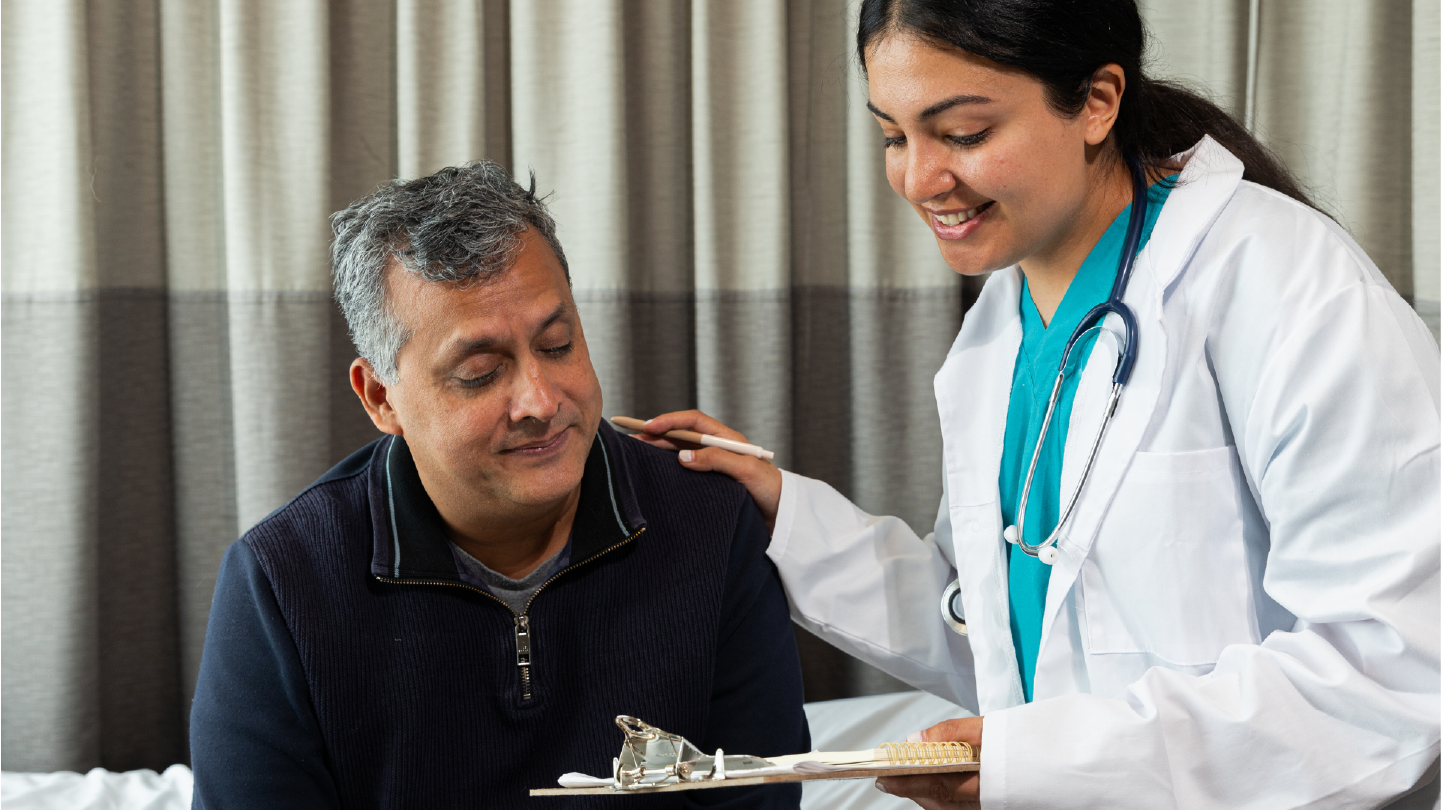 Doctor talking with patient about billing options