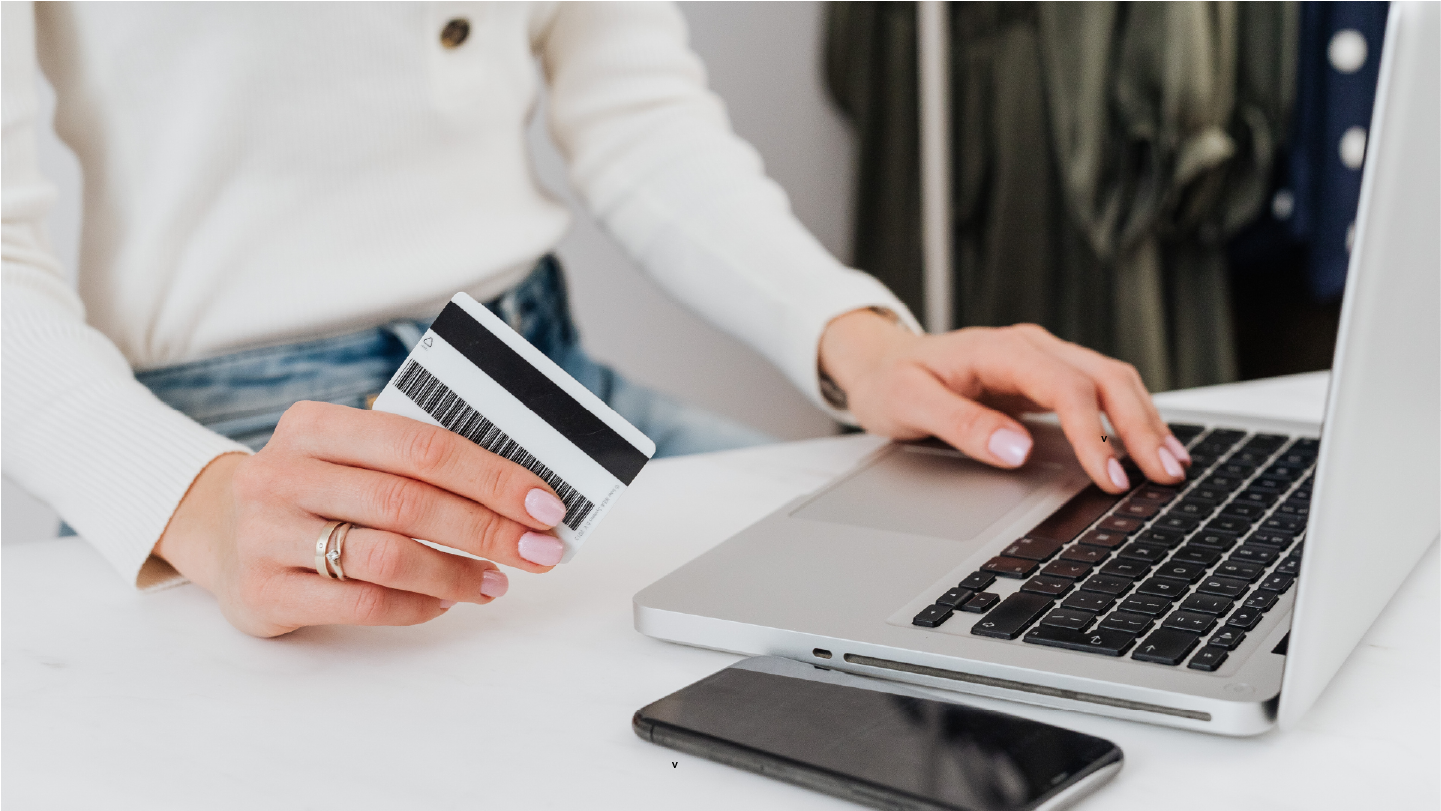 A woman making a payment with their credit card, ending the medical billing chase