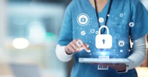 Evolving healthcare landscape - A female medical professional holding a tablet device showing different medical technology icons.