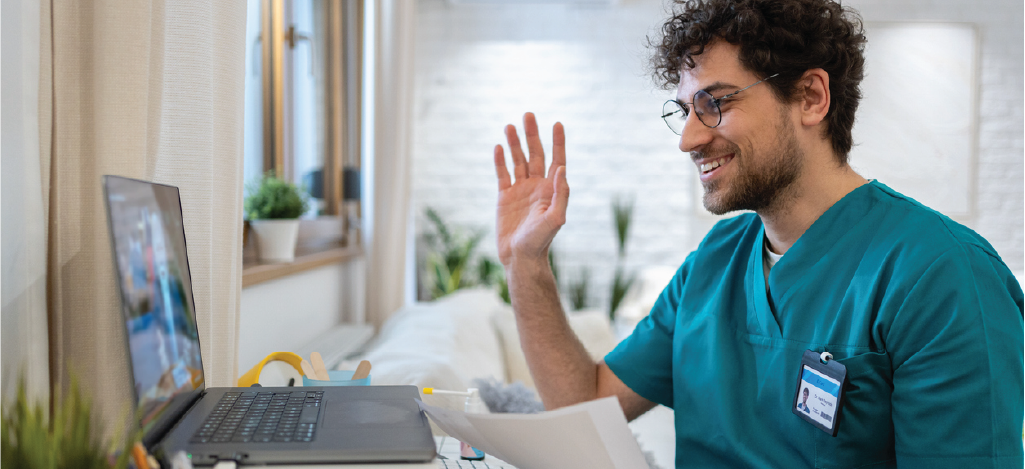 Optimizing telehealth billing for patients - A doctor using a laptop during a telehealth medical appointment with a patient.